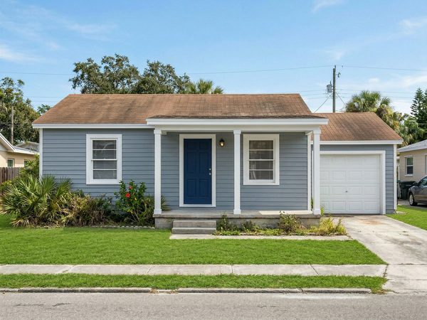 Freshly painted house exterior with clean bright finish and curb appeal