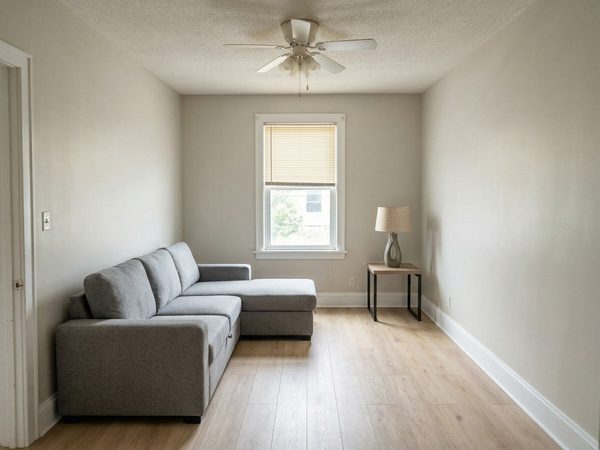 Bright modern living room with freshly painted white walls